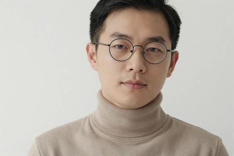 Diony, a long-distance niche dating site member, in a minimal white studio portrait