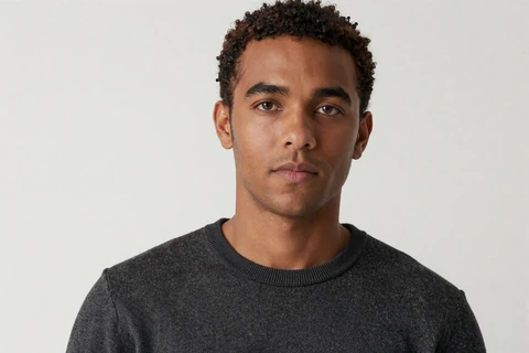 Marcus, a 34-year-old small penis dating member, photographed in calm daylight against white